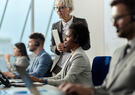A manager monitors a team in a call center
