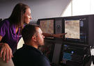 Operators at a screen