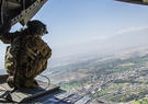 Service personnel looking out of aircraft