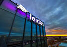 Image of the Leidos HQ Sign on top of the building