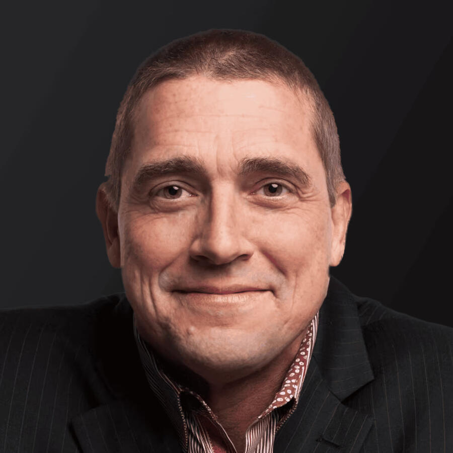 A close-up photograph of Ted Tanner