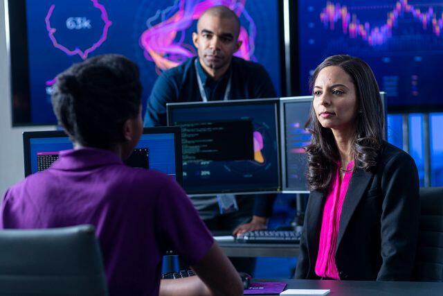 team working on dashboards and computer