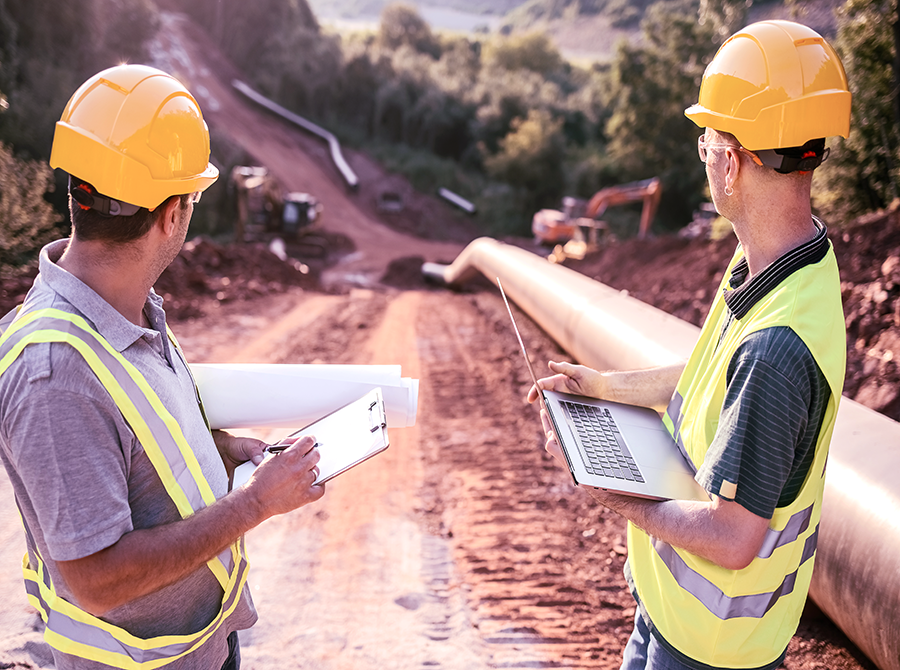 Engineers overseeing oil and gas asset integrity and compliance