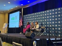 Leidos experts presenting at a Women in Defense conference