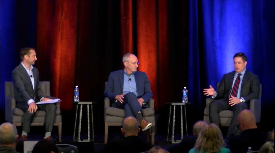 Andy McDonald moderates a fireside chat with government guests