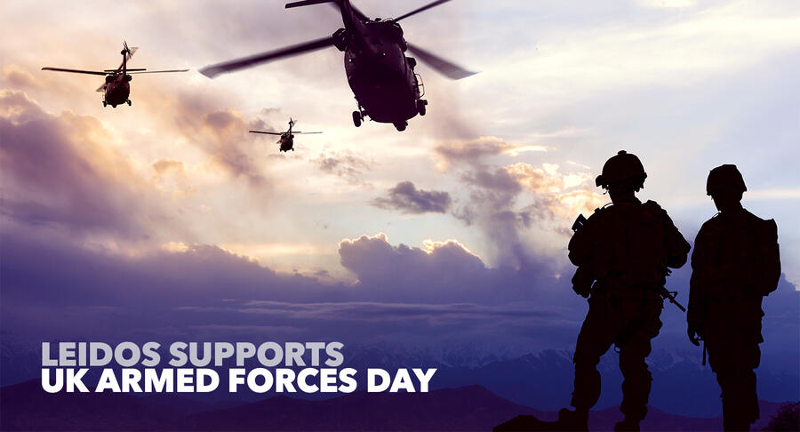 graphic showing military scene for UK armed forces day