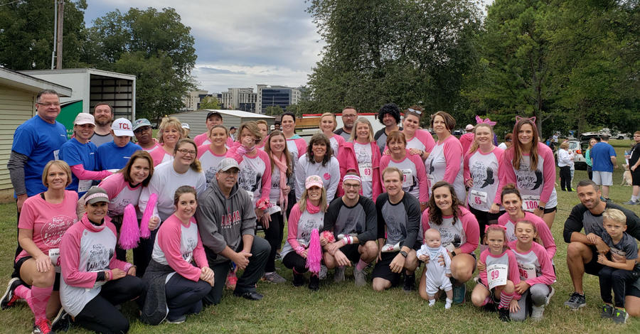 Dinah Ray and her team pose for the Liz Hurley Walk in 2019