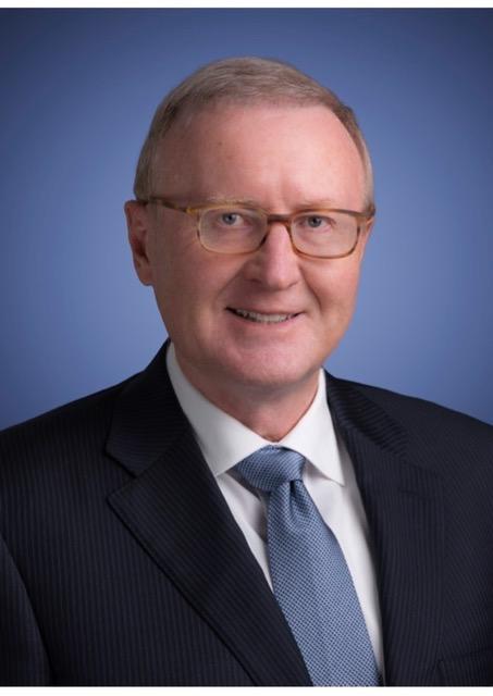 Frank Pandolfe pictured in front of a blue background