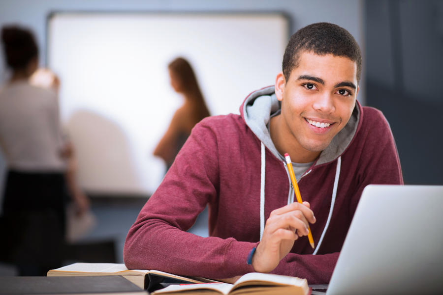 teenage boy with laptop