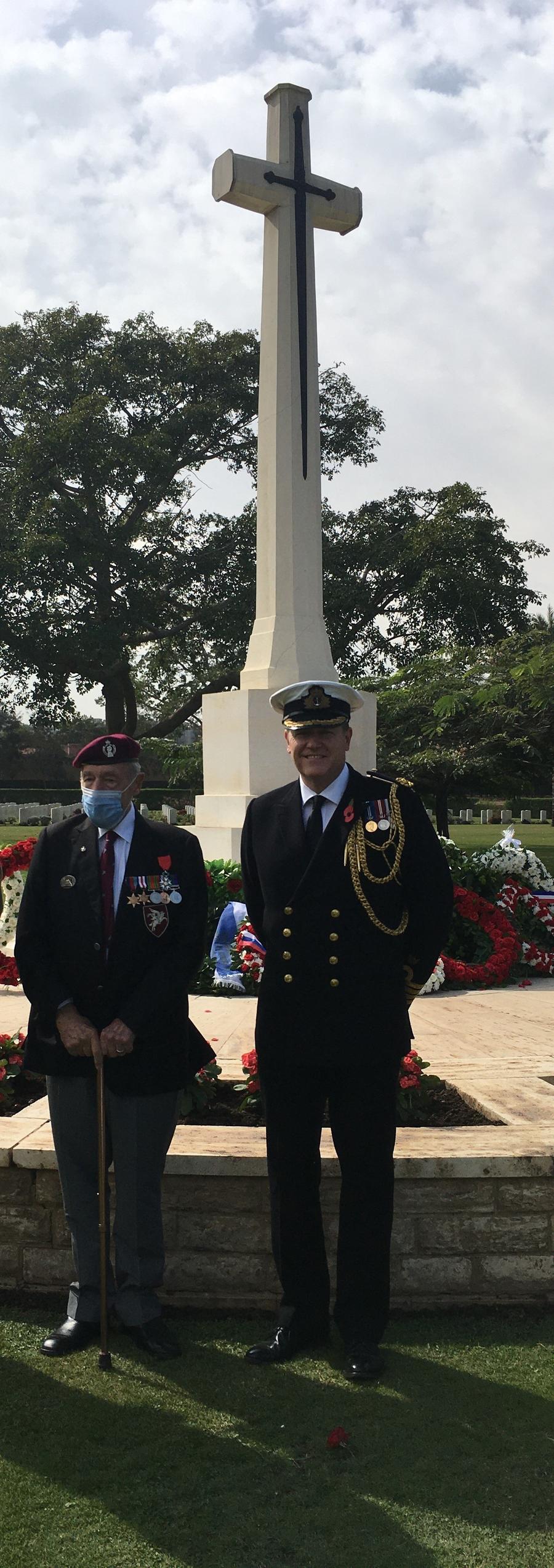 two soldiers in front of cross meor