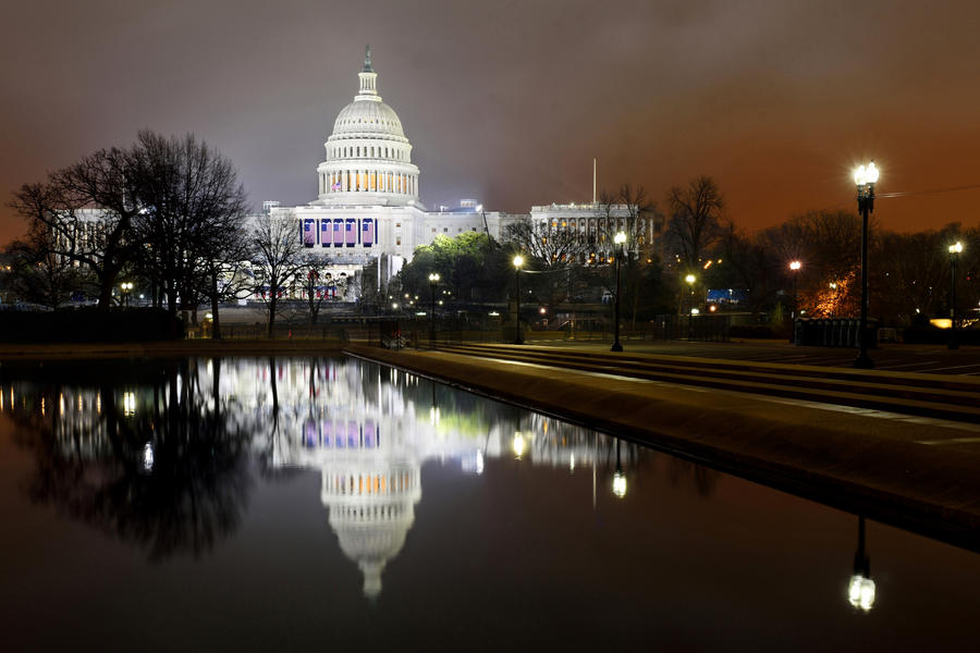 U. S. capitol building at night  