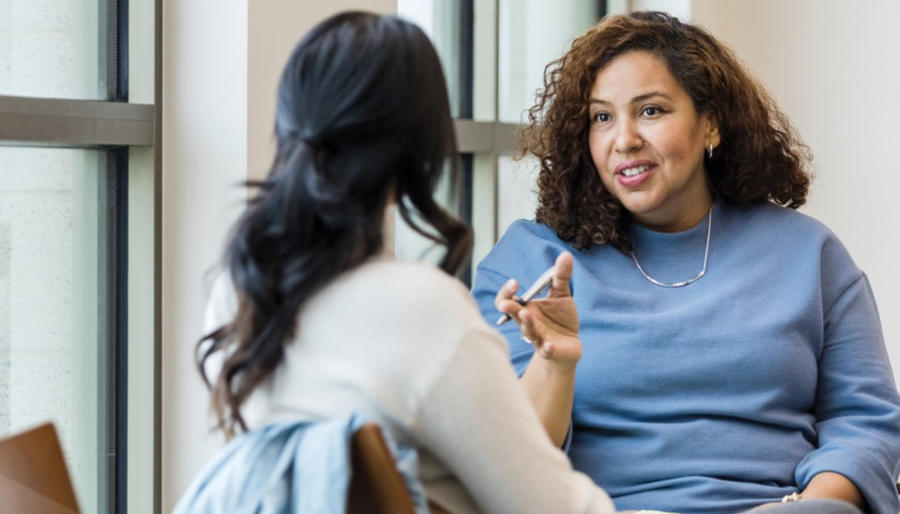 Two females having a discussion