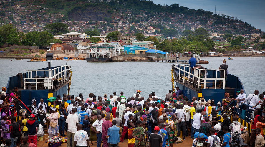 A ferry docking at the harbor of Freetown in Sierra Leone. 