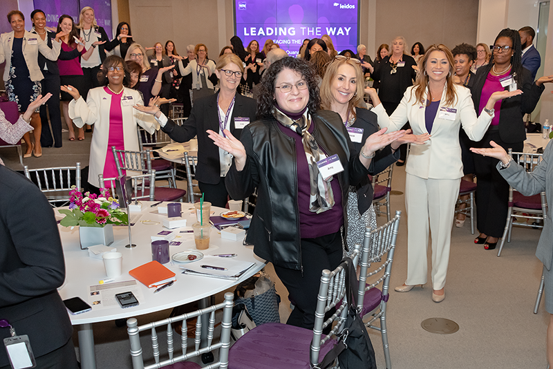 photo of packed room at Women's Forum