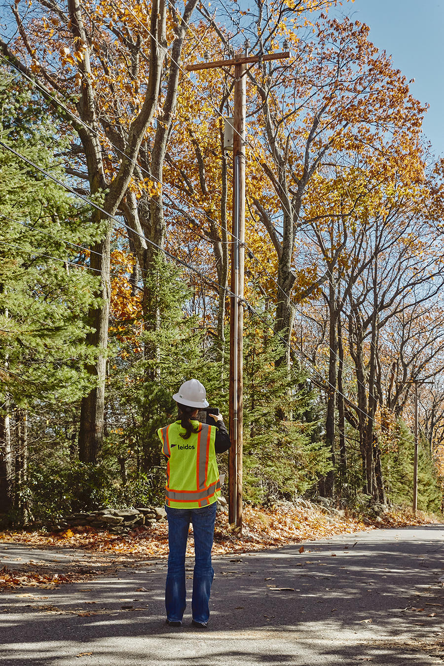 Leidos employee performing a field assessment