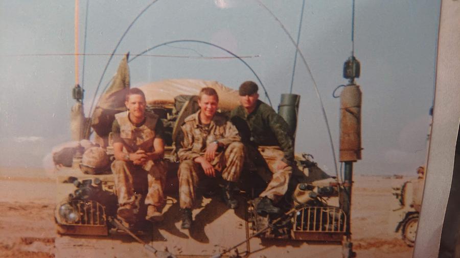 Nick and group of people in Gulf war