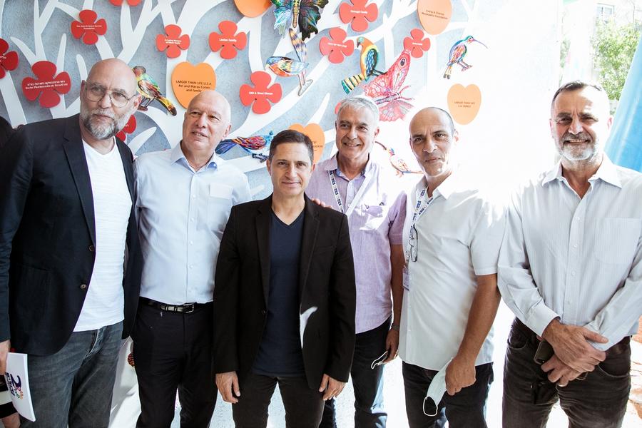 Six men involved in the project posing for a picture
