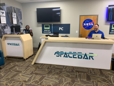 SpaceBar desk with people 