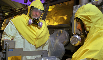 2 men in safety gear