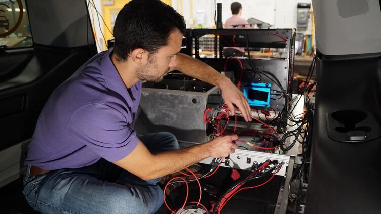 engineer adjusting sensors