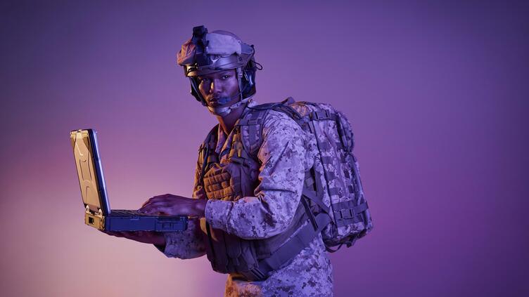 Solider with rugged laptop
