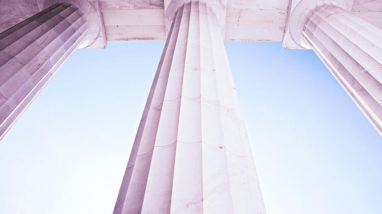 view from below three large pillars