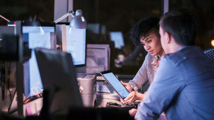 coworkers with tablet