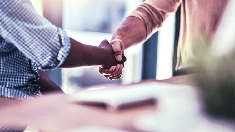 people shaking hands