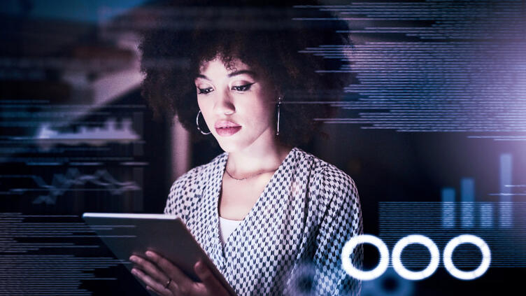 A woman works on a tablet