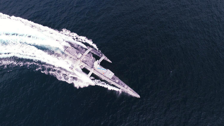 A bird's eye view of a ship on the ocean