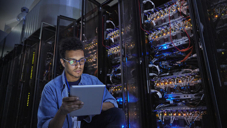 man working on data servers