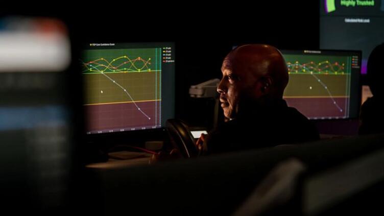 Man looking at dashboards