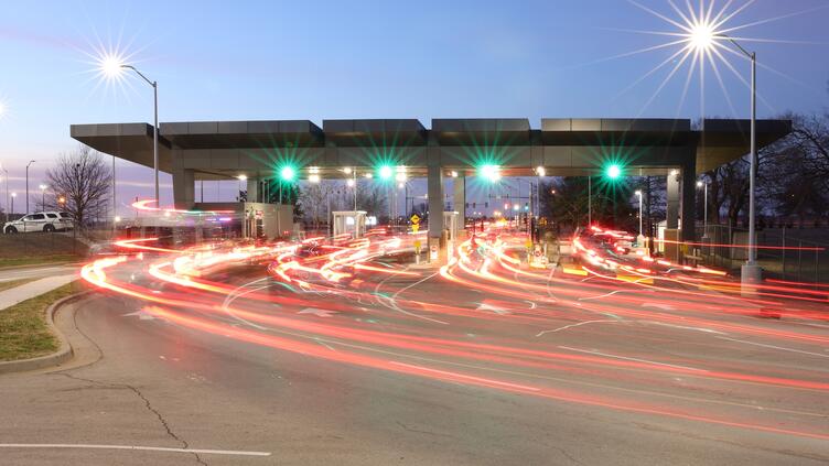 A time lapse photo depicting traffic entering Tinker Air Force Base via the Main Gate Feb. 15, 2024.