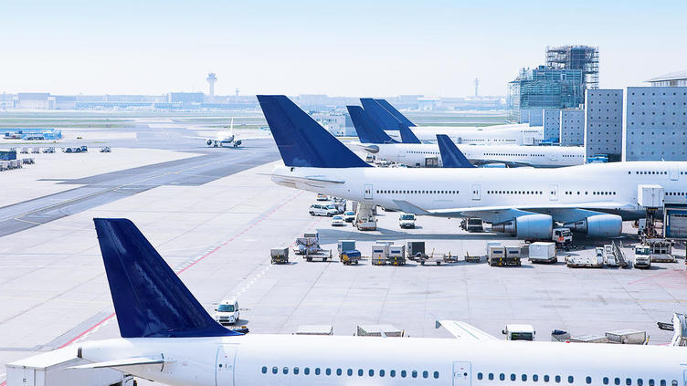 tail end of airplanes at the airport