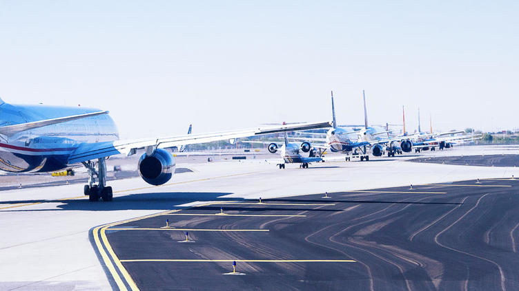 multiple planes on a runway