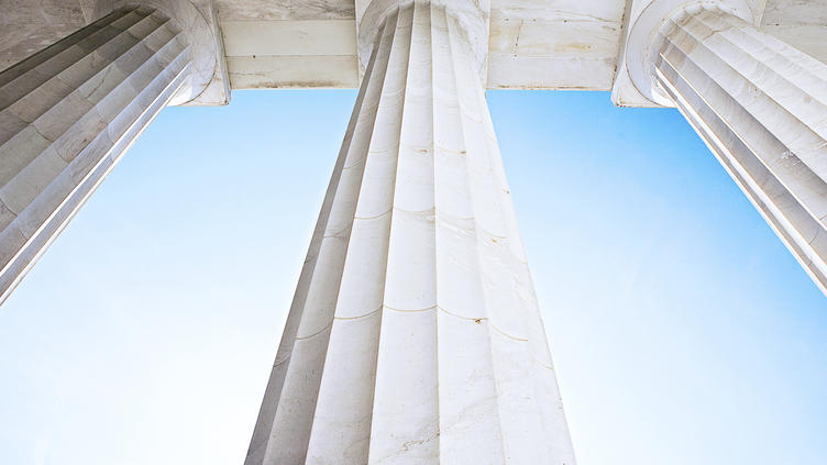 view from below three large pillars