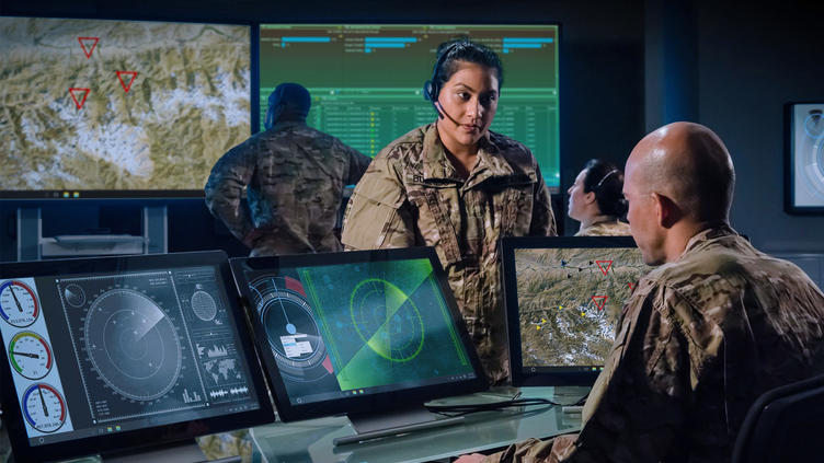 Military command and control center with female leader briefing staff