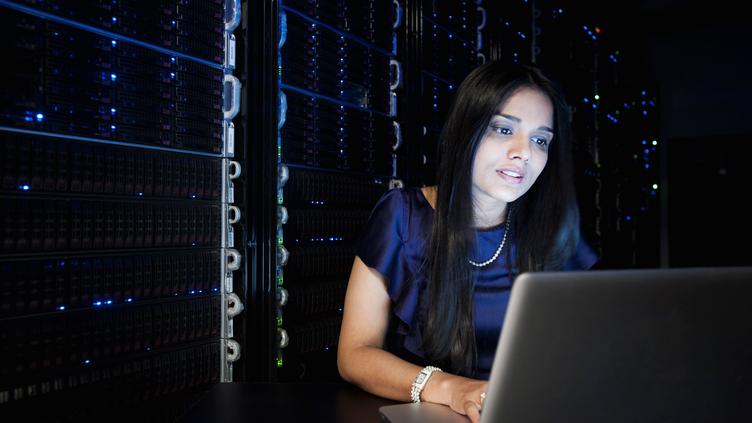 woman looking at laptop