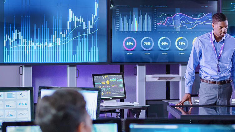 Two analysts working with analyzed data