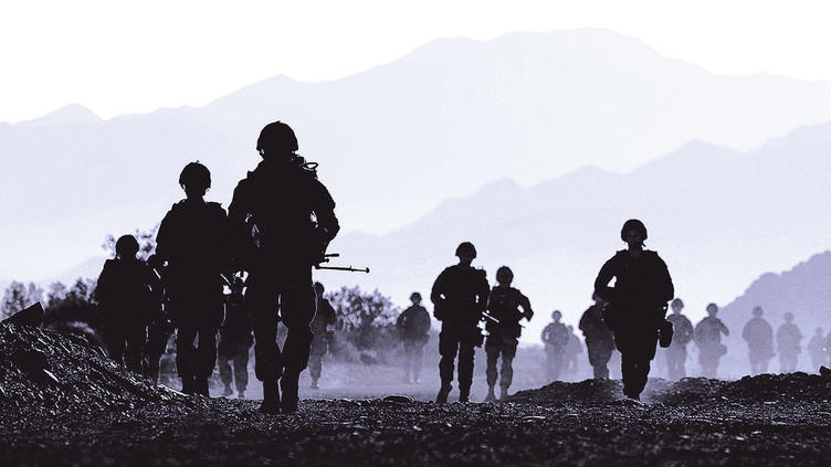 silhouette of soldiers running