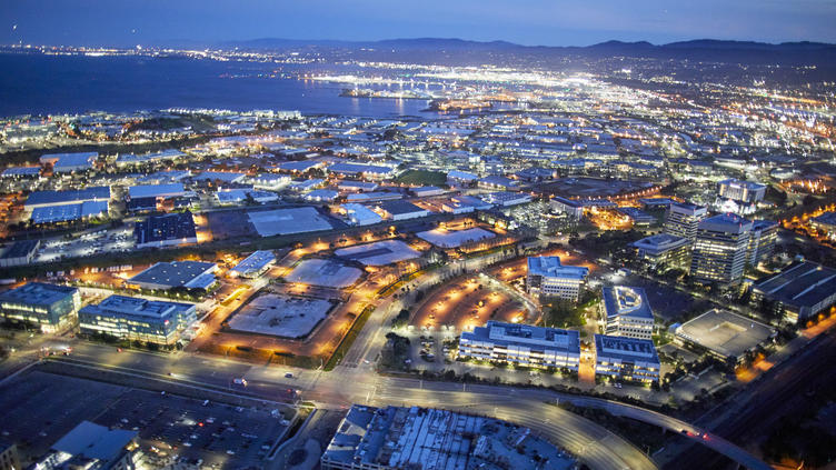 waterfront urban area lit up at night